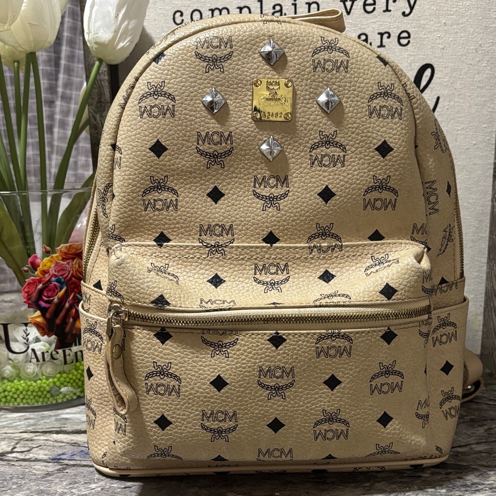 MCM Tan Backpack with Black Logo and Silver Accents